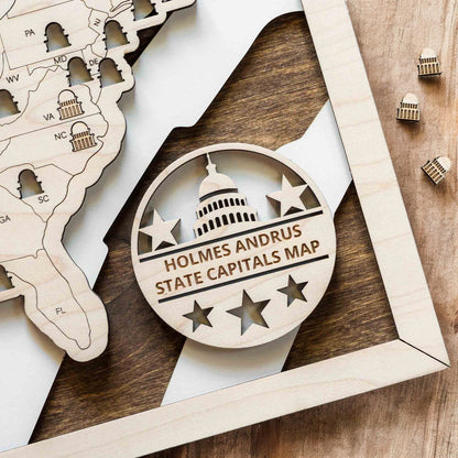 Close up of personalized USA state capitals map badge with engraved Capitol icon and stars
