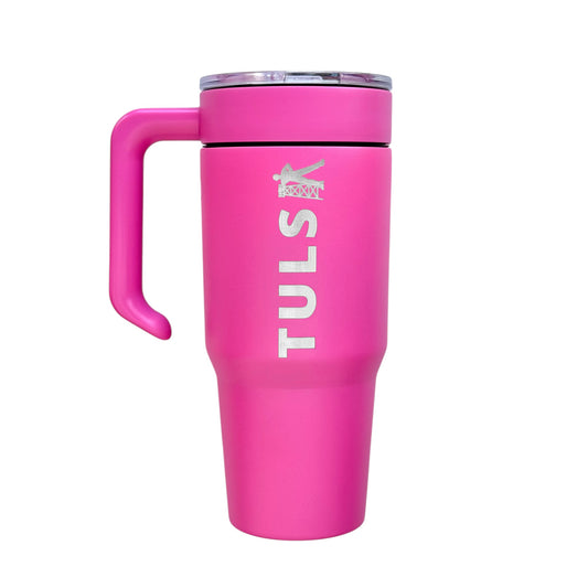 Pink 30oz tumbler featuring vertical TULSA text and iconic Golden Driller design, handle attached