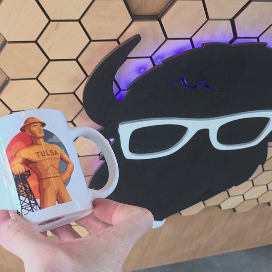 Oklahoma landmark souvenir mug with Golden Driller illustration