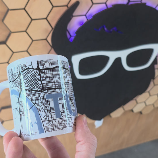 ceramic mug with detailed Tulsa city map and river design.