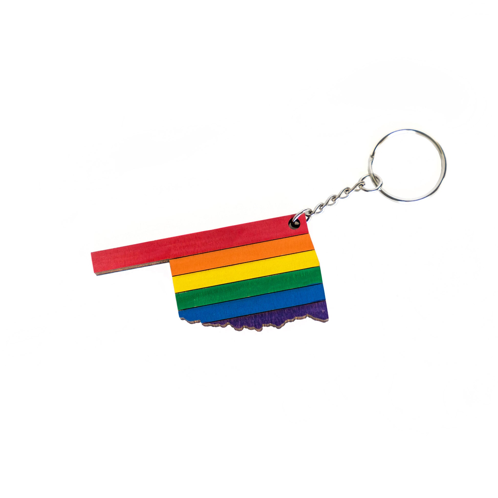 A colorful keychain shaped like Oklahoma, featuring vibrant rainbow stripes representing pride and inclusivity.