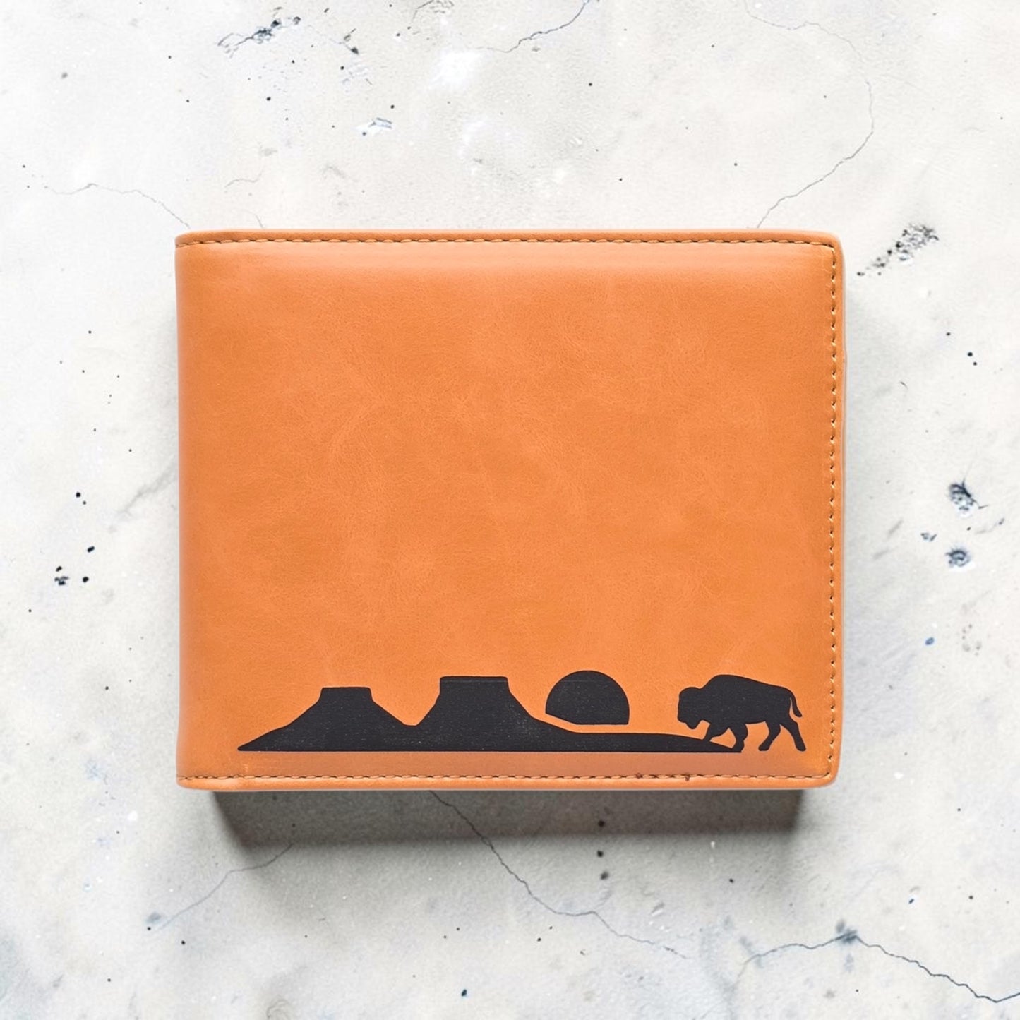 RFID Wallet Bison Plateau Landscape Mens Bifold displayed on stone background with stitched leatherette finish and minimalist western bison scene, useful gift wallet for men