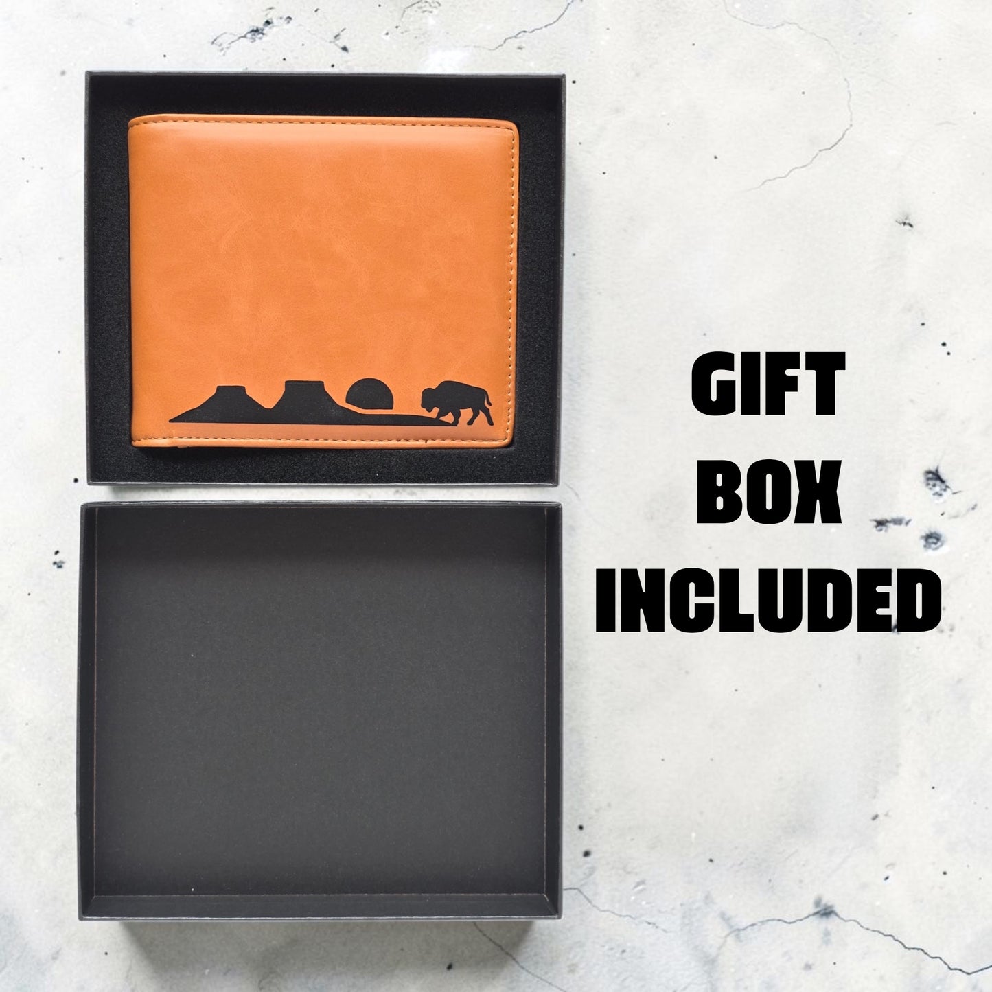 RFID Wallet Bison Plateau Landscape Mens Bifold shown inside black gift box, ready to gift western style men’s wallet with bison and mesa artwork