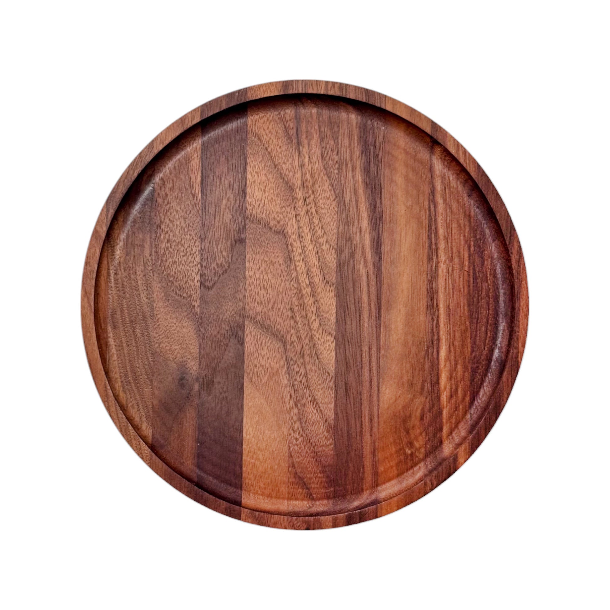 Isolated image of round walnut tray showing rich grain detail and routed edge