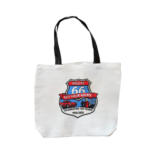 Route 66 Centennial canvas tote bag with colorful Get Your Kicks design celebrating 100 years of Route 66 from 1926 to 2026, featuring retro road trip artwork on a white travel souvenir tote bag with black handles