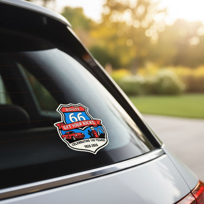 Route 66 Centennial Get Your Kicks vinyl decal applied to a car window with sunset lighting, retro road trip souvenir sticker celebrating the Mother Road centennial anniversary