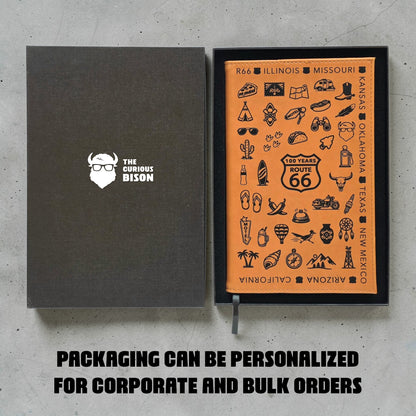 Route 66 travel icons journal notebook packaged in black gift box with Curious Bison logo showing engraved leatherette cover designed for Route 66 travelers and souvenir gifts