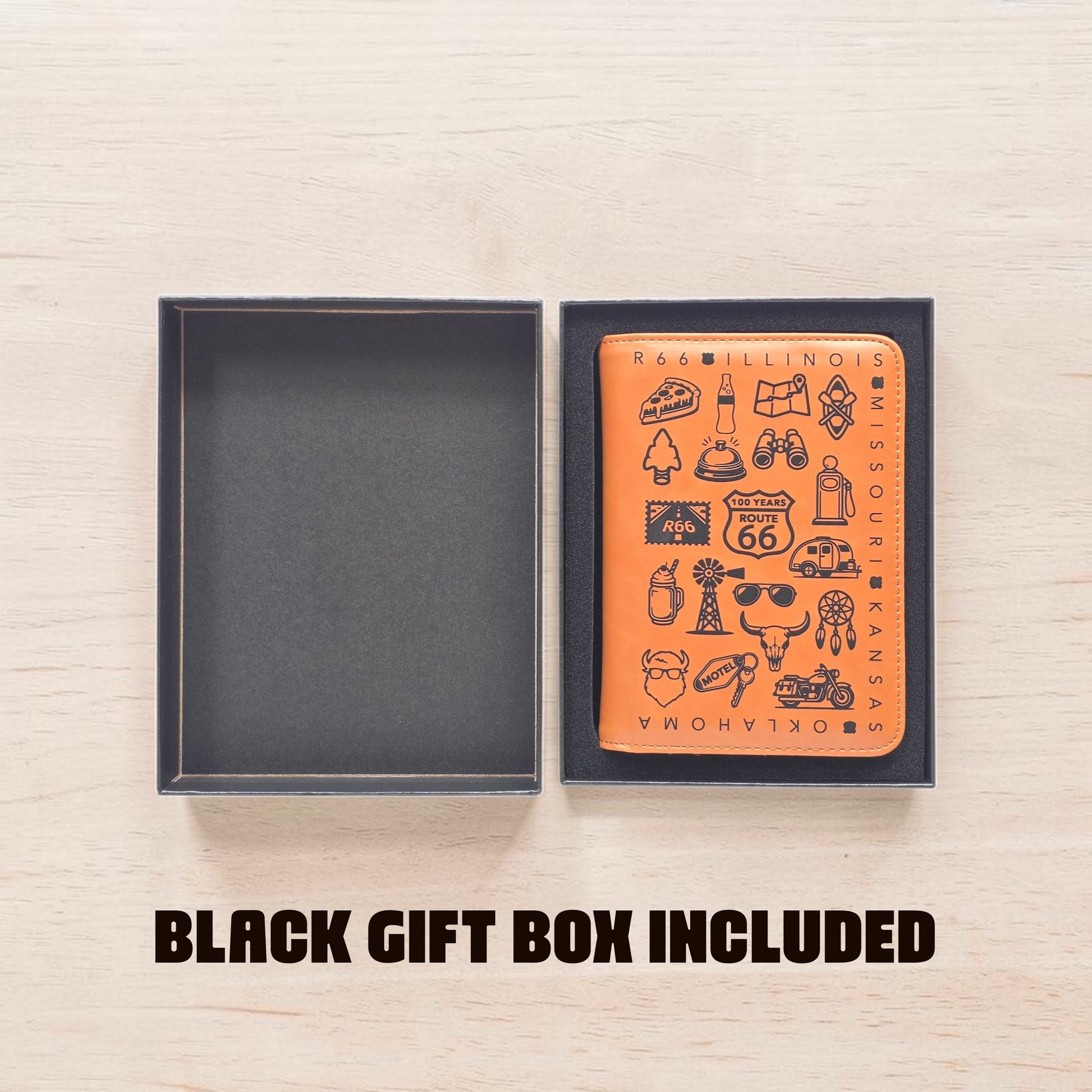 Route 66 passport wallet displayed inside a black gift box with foam insert on a light wood surface, showing gift ready packaging for a travel themed passport holder and road trip souvenir gift