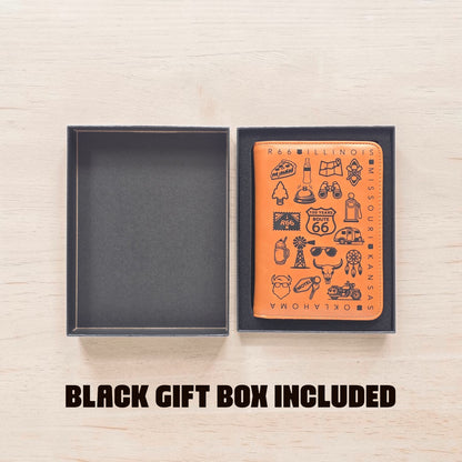Route 66 passport wallet displayed inside a black gift box with foam insert on a light wood surface, showing gift ready packaging for a travel themed passport holder and road trip souvenir gift