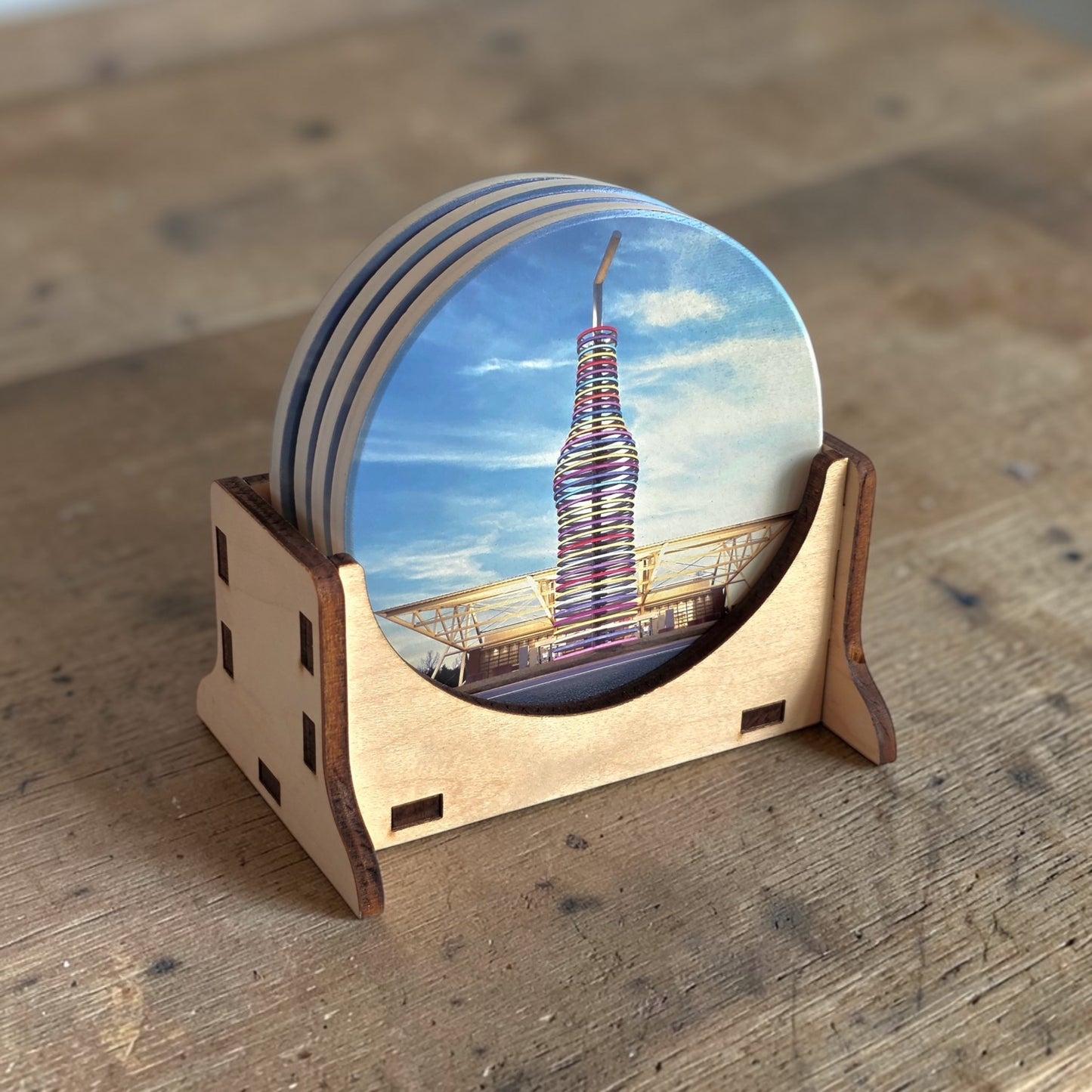 Multiple Route 66 Pops ceramic coasters displayed in a laser cut wood holder, Oklahoma souvenir coaster set for gift shops and home entertaining