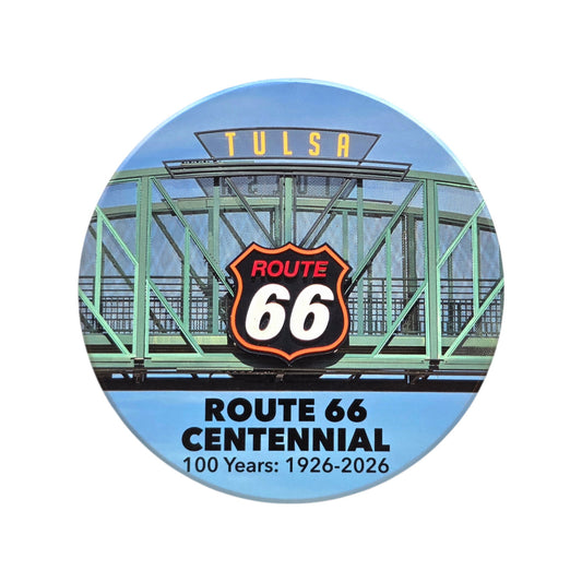Front view of Route 66 Tulsa bridge sign round ceramic coaster featuring Tulsa landmark and Route 66 centennial design on plain background