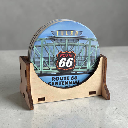Set of Route 66 Tulsa ceramic coasters stacked in laser cut wood holder on gray surface, Tulsa Oklahoma souvenir coaster set for gifts and travel memories