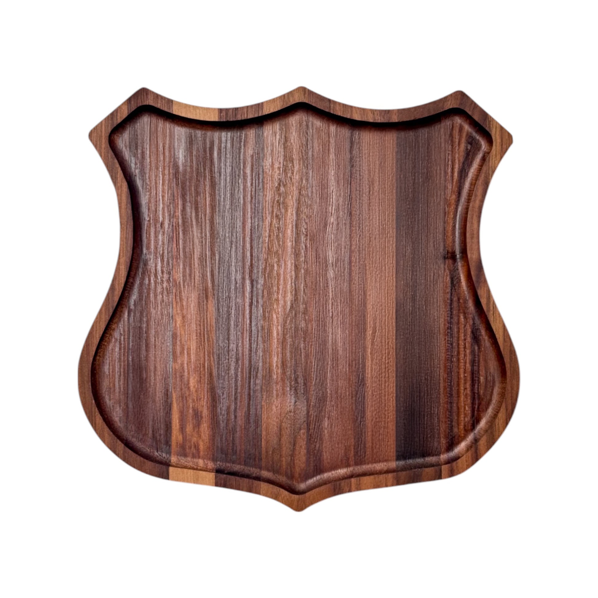 Route 66 walnut catch all tray in badge shape shown from above, solid walnut wood tray with recessed edge, travel themed desk or entryway organizer gift made in the USA