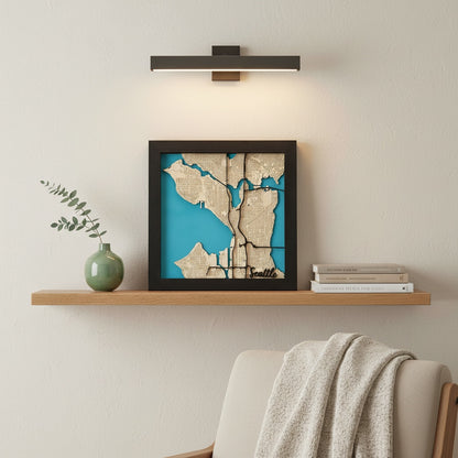 Seattle wooden city map wall art displayed on shelf with modern home decor, framed layered wood map used as travel inspired wall piece