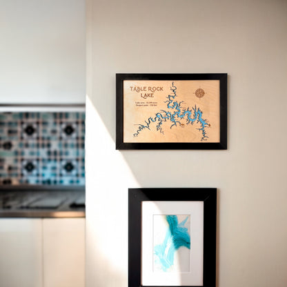 Table Rock Lake wooden map wall art hanging on wall in black frame, laser cut lake map decor for home or cabin