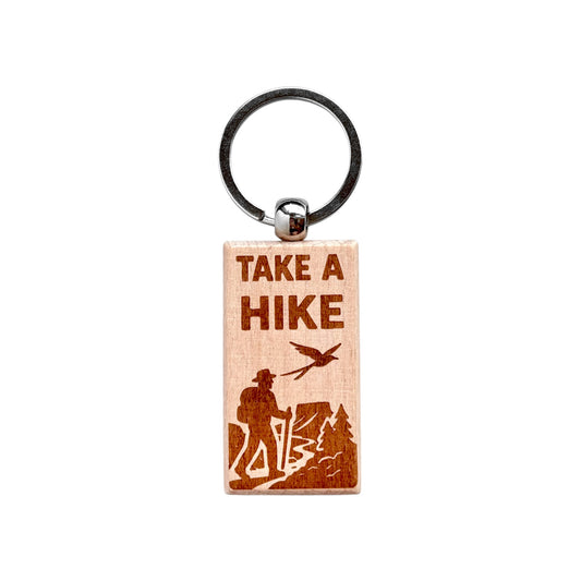 Rectangular wooden take a hike keychain with laser engraved hiker, mountains, trees, and scissortail flycatcher, lightweight wood keychain with metal ring for hiking gift or outdoor souvenir made in the USA