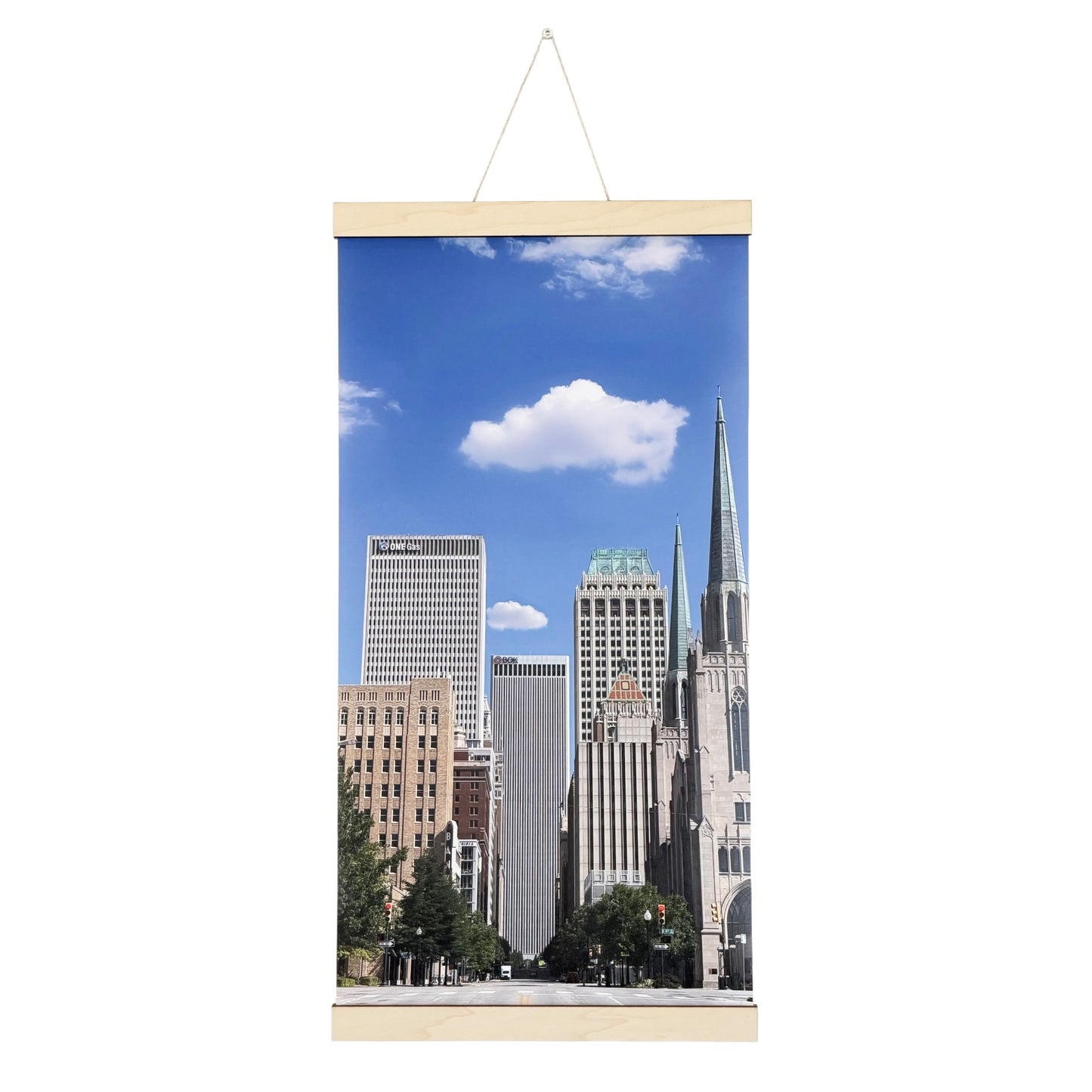 Tulsa downtown canvas wall hanging featuring original photography looking north along Boston Avenue with downtown buildings, church spires, blue Oklahoma sky, and natural wood hanging rails