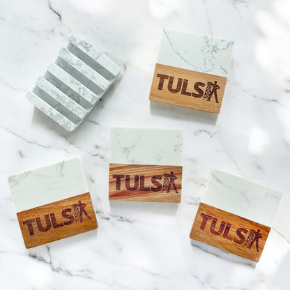 Set of four Tulsa Driller marble coasters shown with heavy marble display base, Tulsa coaster set gift option for home or office