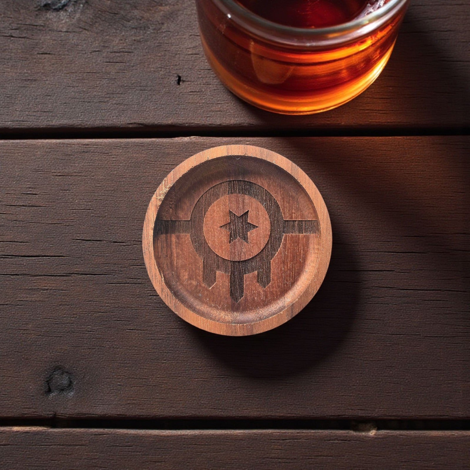 Flat lay of a Tulsa flag walnut ring tray on a wood surface, laser engraved wooden dish used as a ring holder or desk catchall