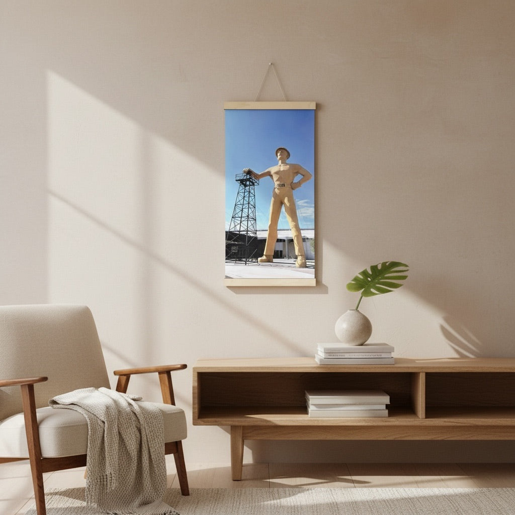 Tulsa Golden Driller canvas wall hanging displayed in a living room, featuring original photography of the Oklahoma landmark as Tulsa home decor and travel souvenir