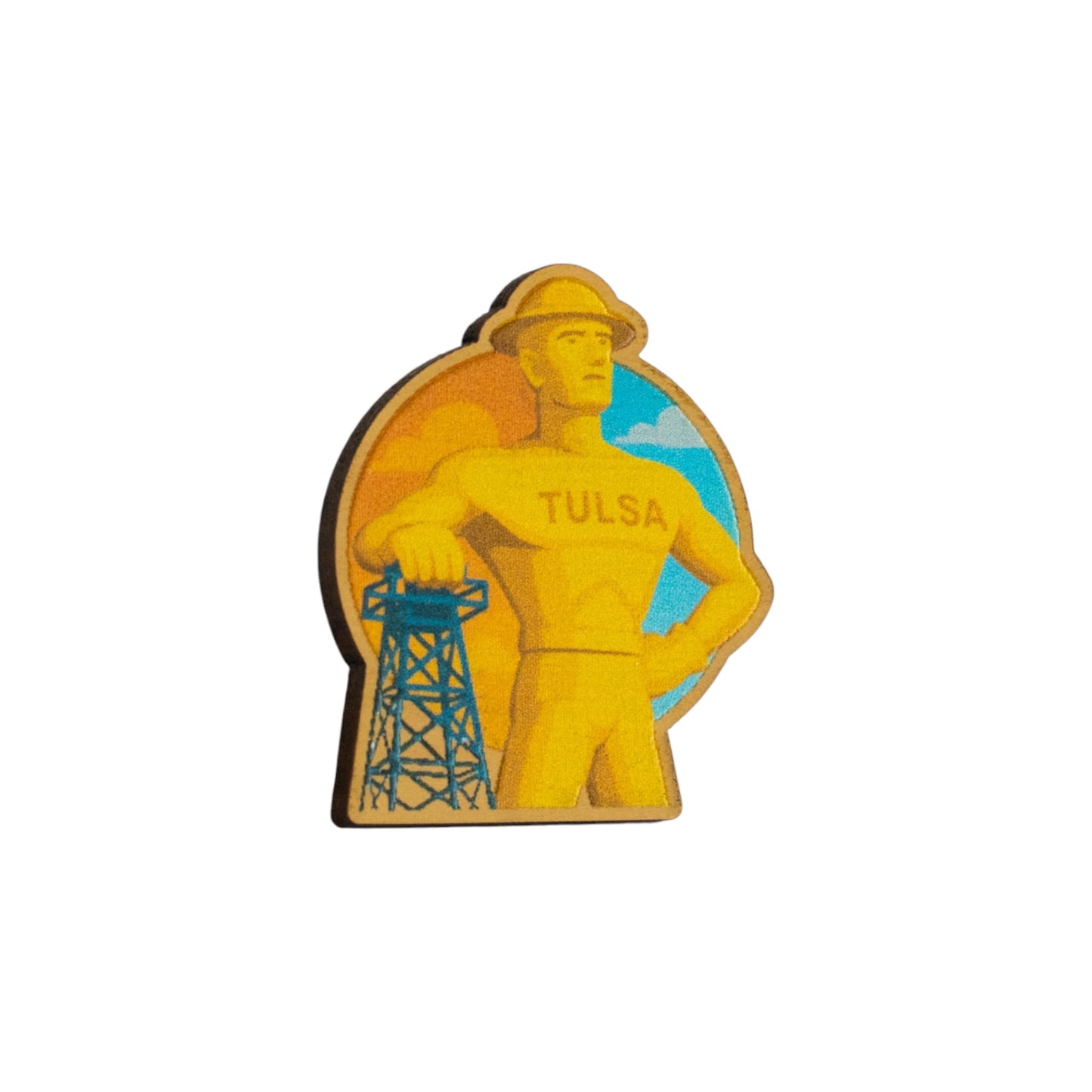 Tulsa Golden Driller wooden lapel pin attached to backpack as Tulsa Oklahoma souvenir gift for travelers and locals