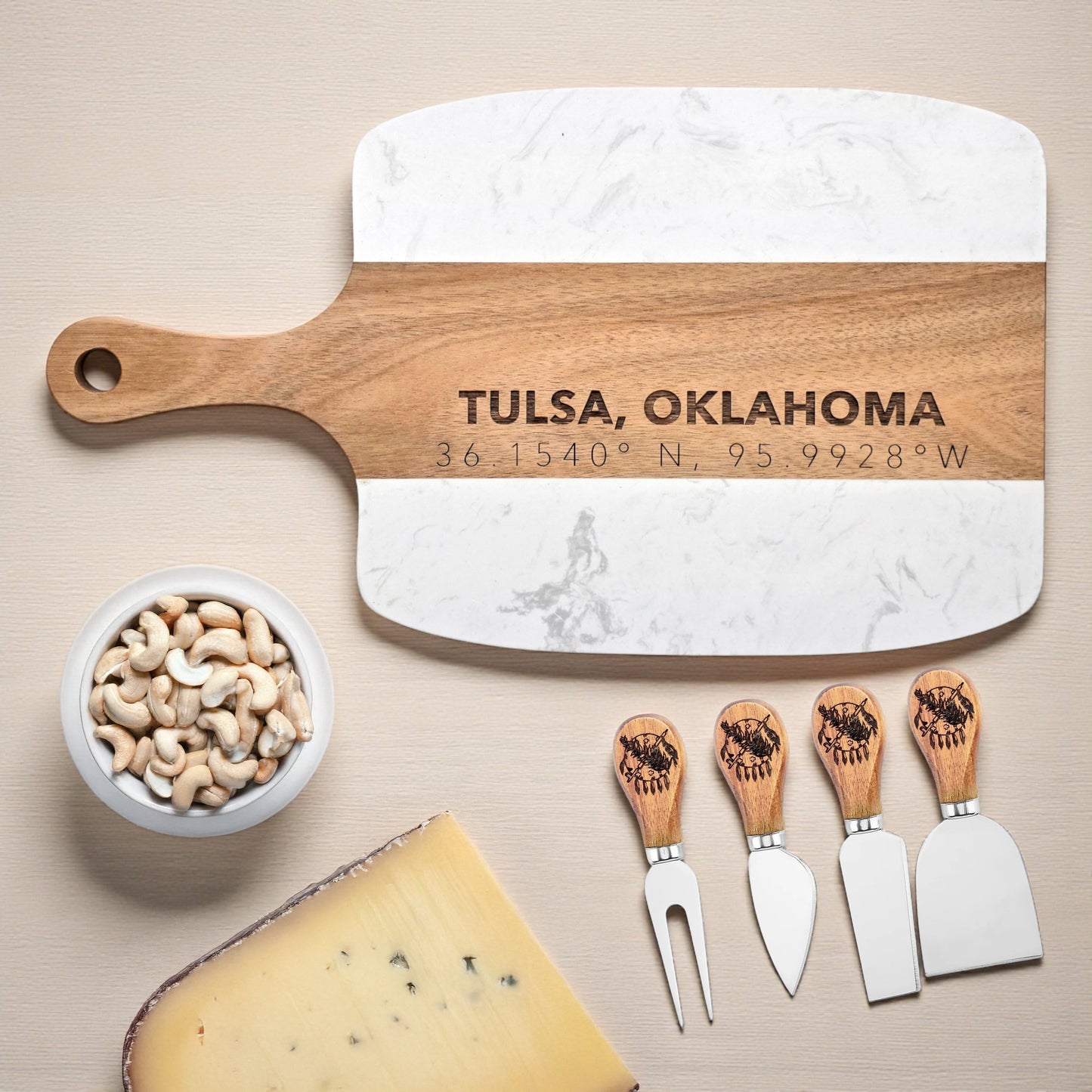  Tulsa Oklahoma serving board with engraved coordinates styled with cashews and cheese wedges, marble wood charcuterie board with four piece knife set for entertaining