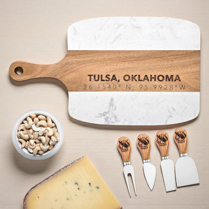  Tulsa Oklahoma serving board with engraved coordinates styled with cashews and cheese wedges, marble wood charcuterie board with four piece knife set for entertaining