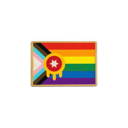 Eco Wood Birch Tulsa Pride lapel pin isolated on white background showing rainbow Tulsa flag style design
