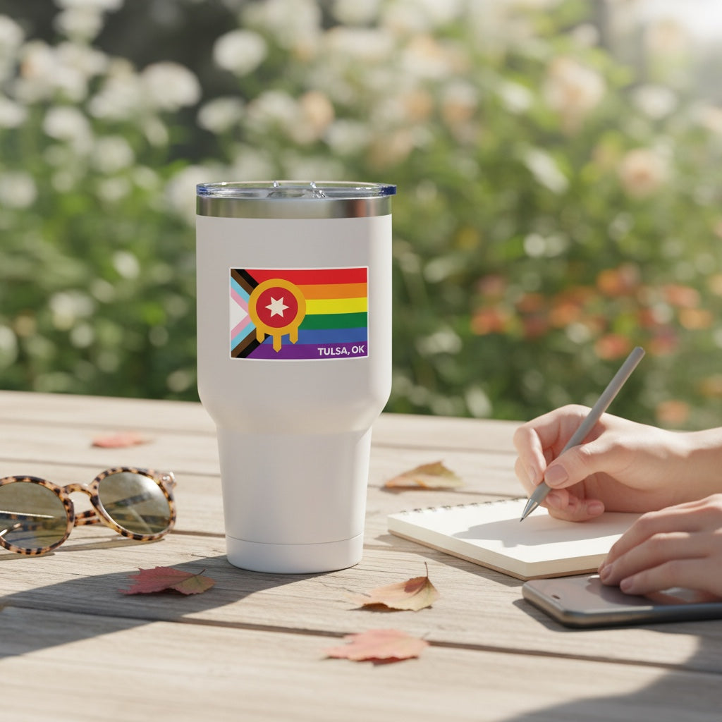 Tulsa Pride flag vinyl sticker displayed on white insulated tumbler, Progress Pride colors with Tulsa emblem used as Oklahoma gift sticker