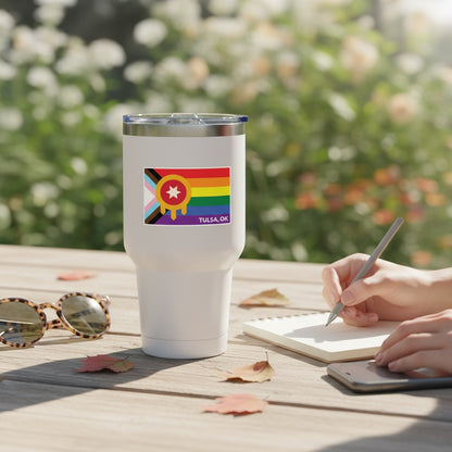 Tulsa Pride flag vinyl sticker displayed on white insulated tumbler, Progress Pride colors with Tulsa emblem used as Oklahoma gift sticker
