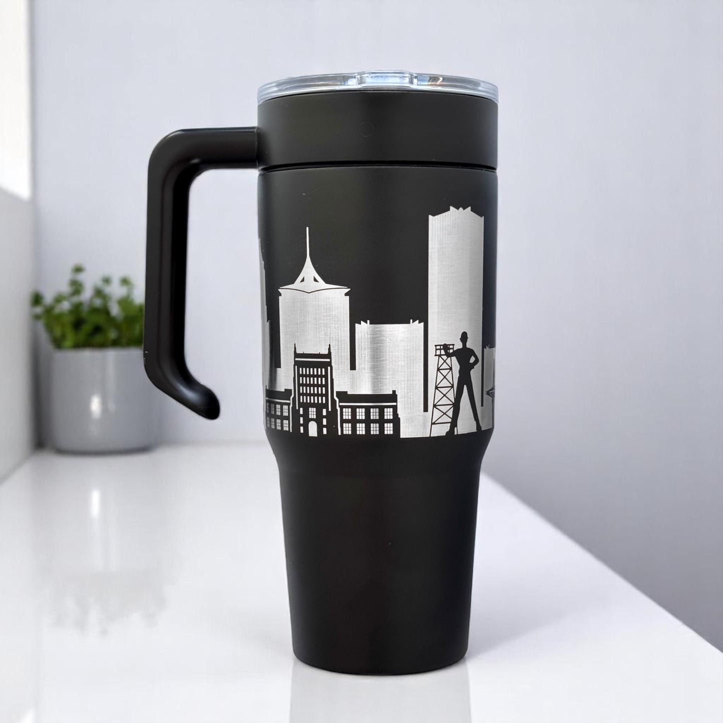 Black Tulsa skyline 30oz insulated stainless steel tumbler with engraved Tulsa buildings and removable handle