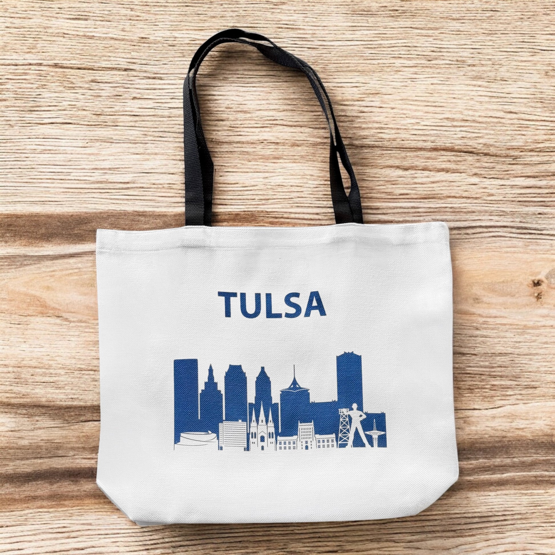 Large Tulsa Oklahoma skyline tote bag standing upright with navy city skyline artwork
