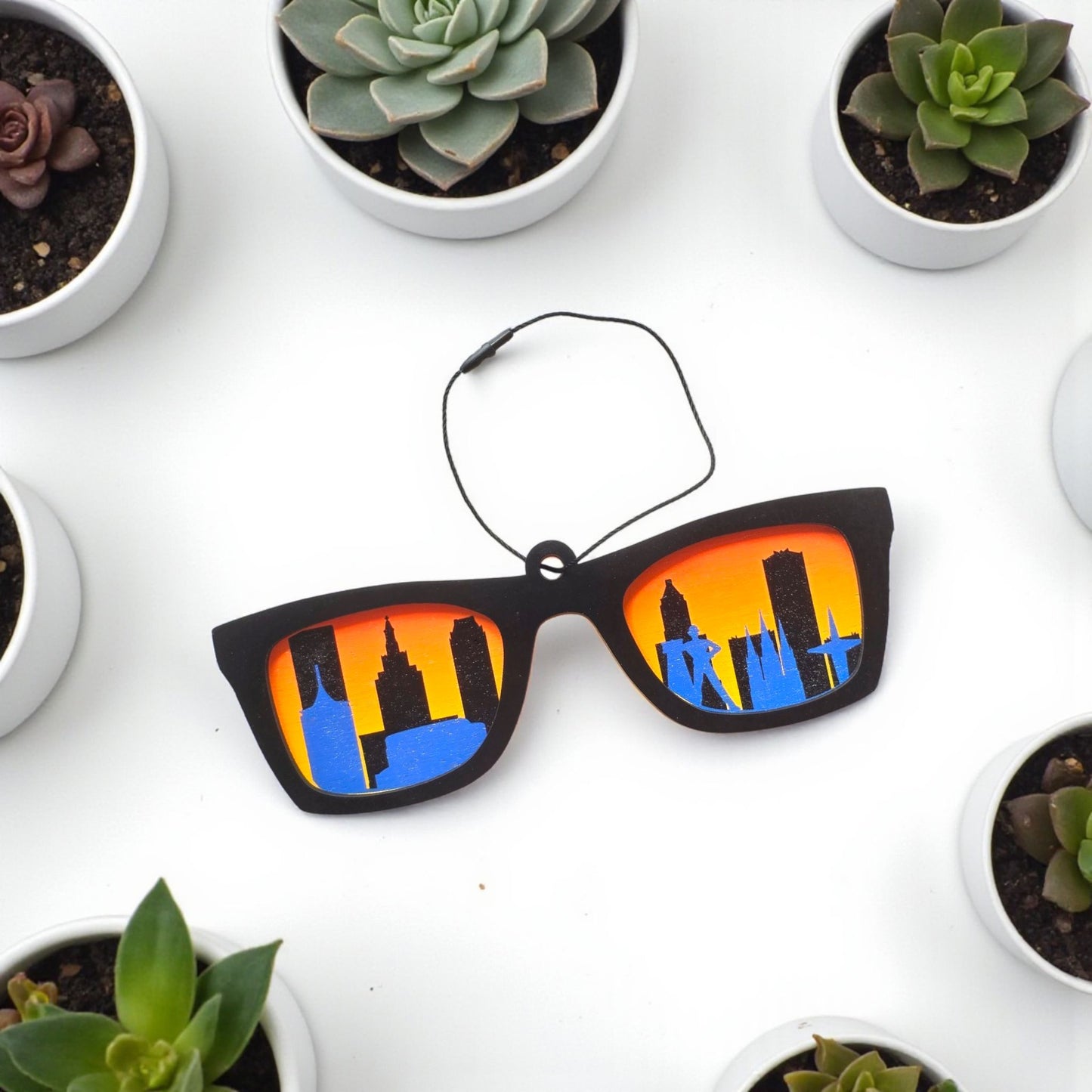 Tulsa skyline sunglasses wooden ornament hanging on evergreen tree with city skyline design, fun Tulsa Christmas ornament or Route 66 souvenir