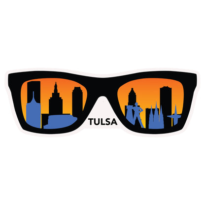 Close up of Tulsa skyline sunglasses vinyl sticker showing black frame, orange gradient background, and downtown Tulsa landmark silhouettes