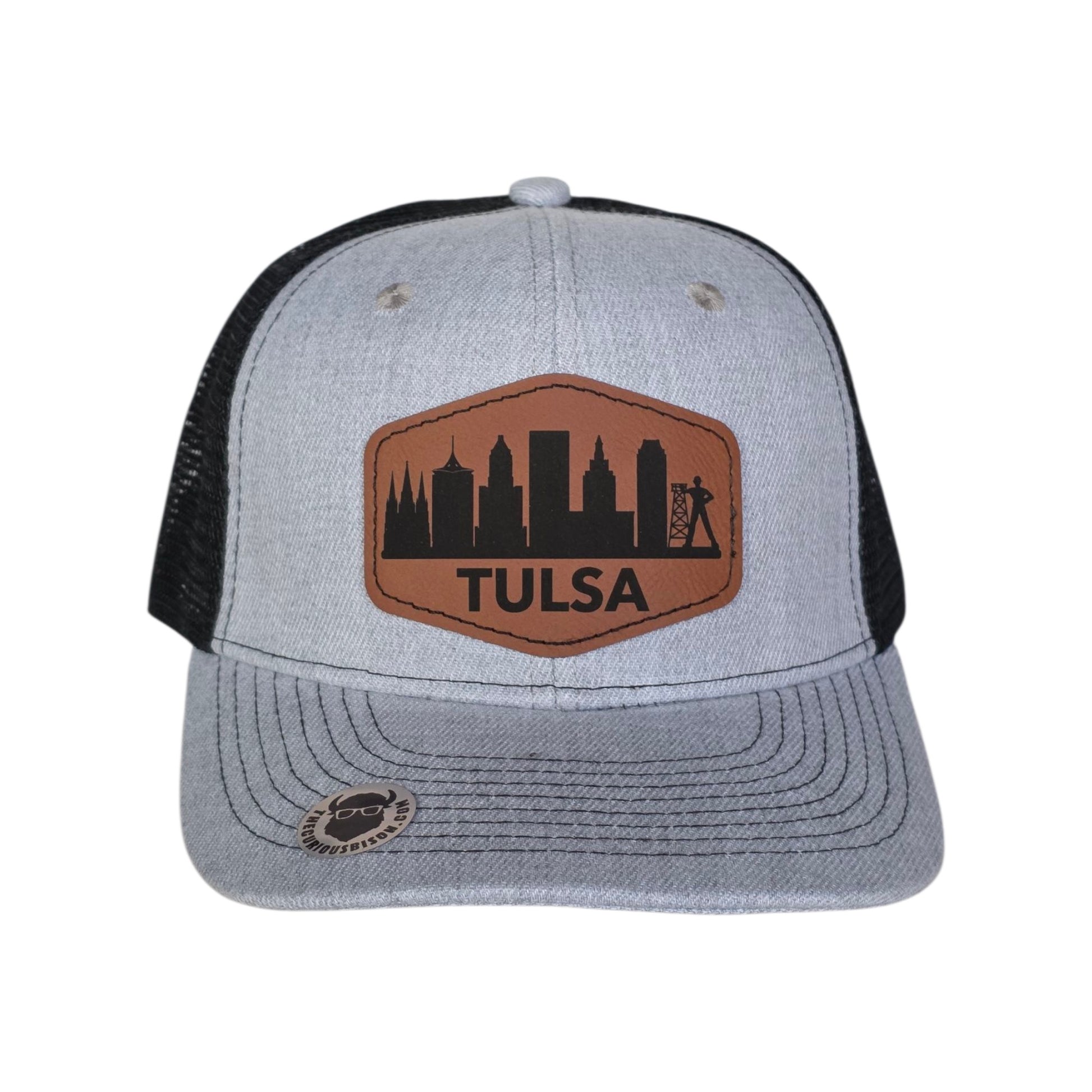 Tulsa skyline trucker hat with engraved leatherette patch showing Tulsa city skyline and Golden Driller, gray and black adjustable snapback hat