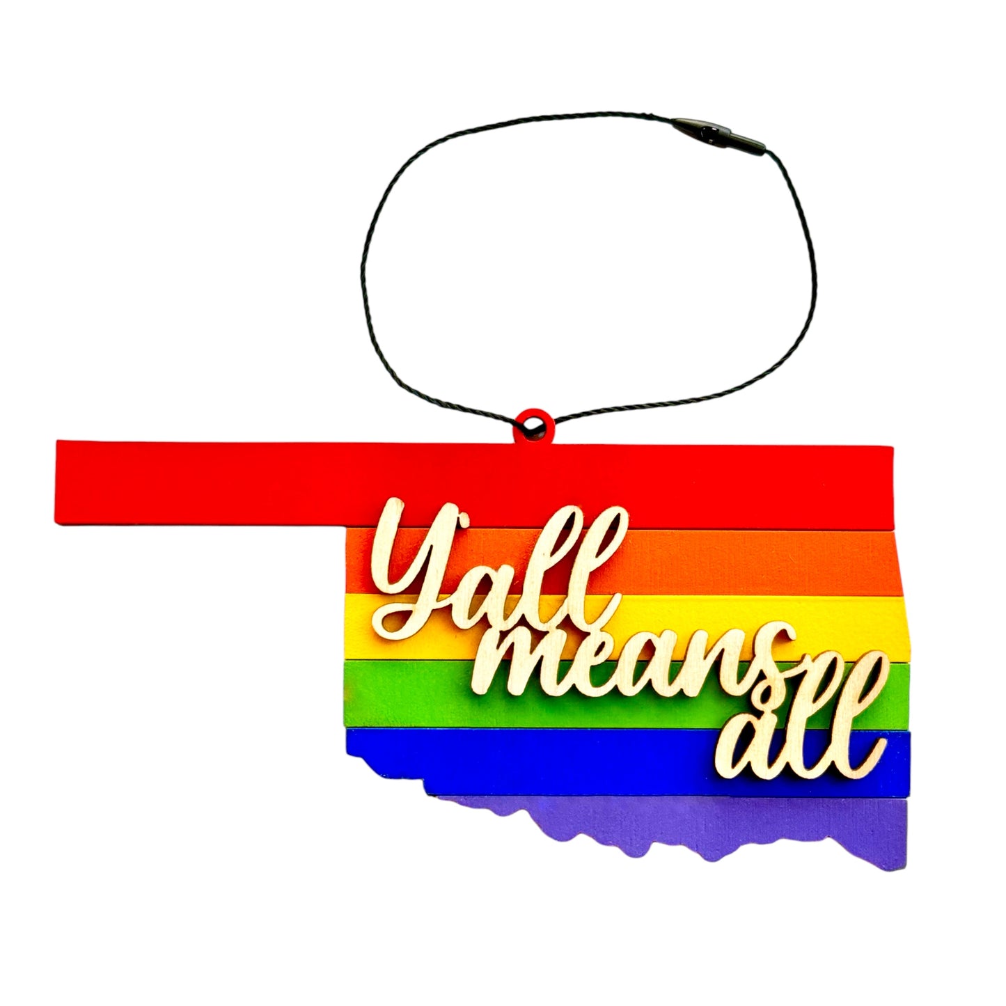 Y’all Means All Oklahoma rainbow wooden ornament in state shape with layered pride colors and raised script text, inclusive Oklahoma pride ornament with hanging cord