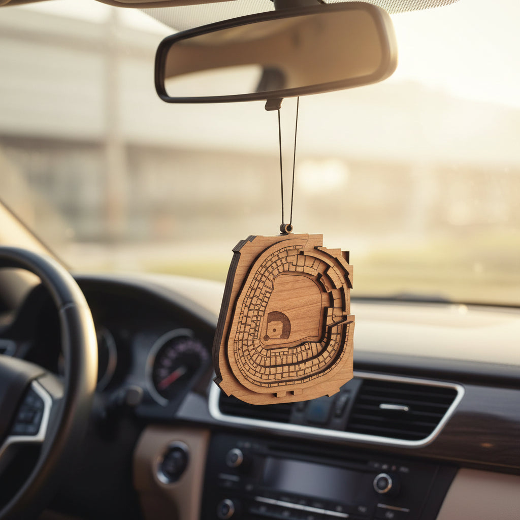 Wooden Yankee Stadium car ornament hanging from rearview mirror, detailed top view baseball stadium design with engraved field and seating layout, layered wood auto accessory gift for New York baseball fans, stadium travelers, and USA sports souvenir collectors